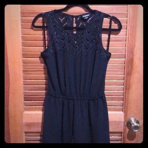 Bebe black romper with lace detail